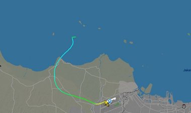 Indonesia plane crash: body parts found at the accident site, debris being extracted from the sea.