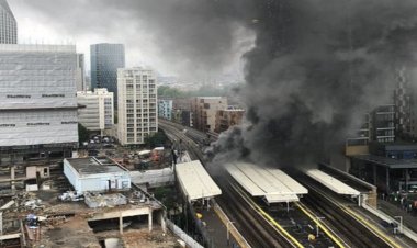 A massive fire broke out near London's Elephant and Castle railway station, an accident caused by an explosion in the track's arch