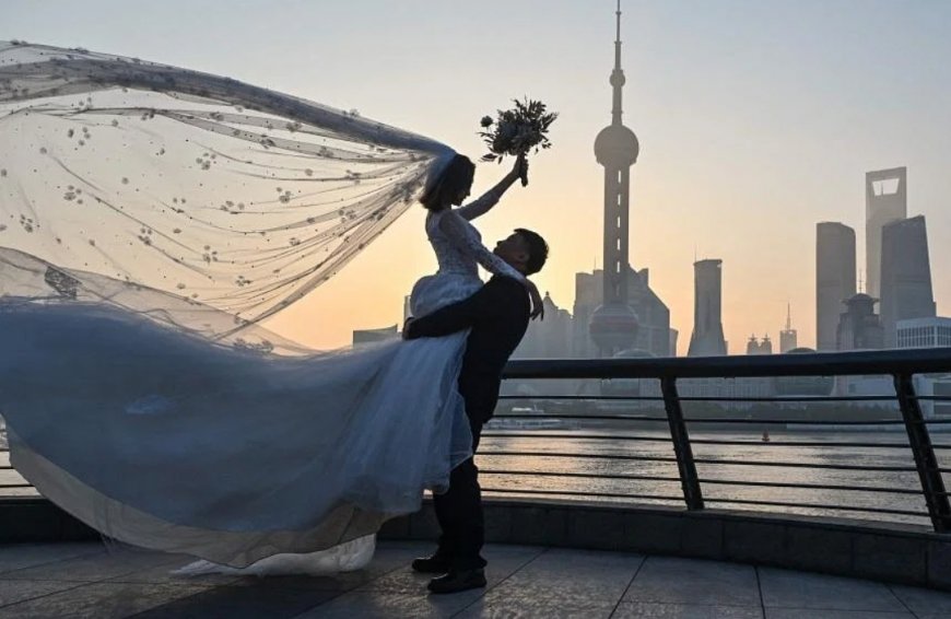 China offers 30 days 'paid marriage leave' to boost birth rate