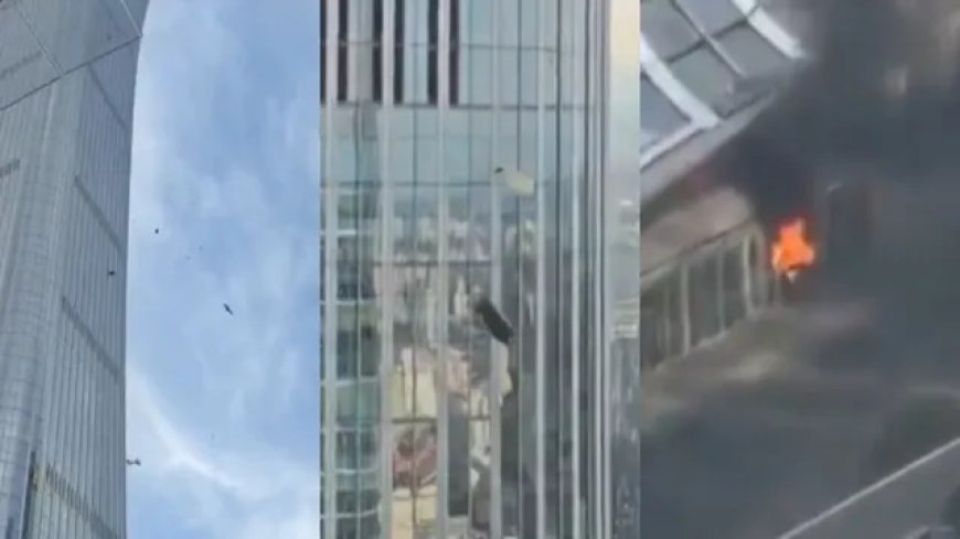 Car-sized aircraft crashes into Beijing's tallest building; police seal off the area.